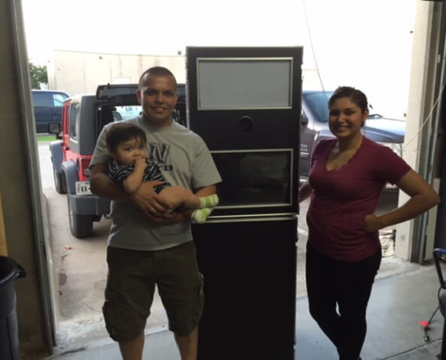 Clients Posing With Photo Booth