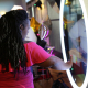 woman viewing a photo booth for sale