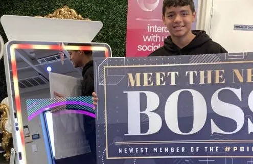Teen entrepreneur buying his first photo booth for a rental business