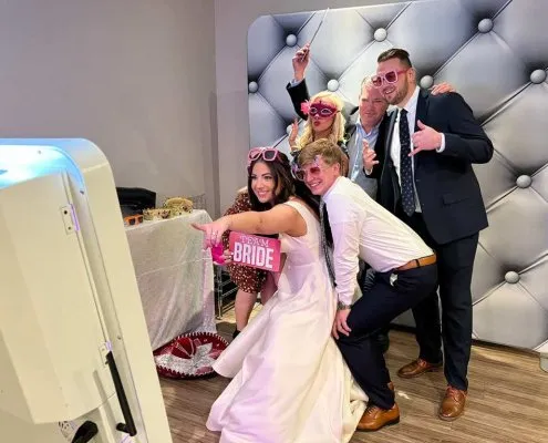 Bridal paraty posing with photo booth